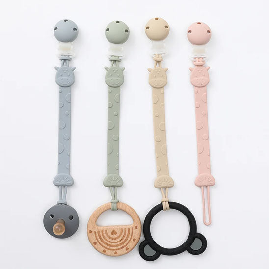 attache tétine en silicone bleu, vert crÚme, rose