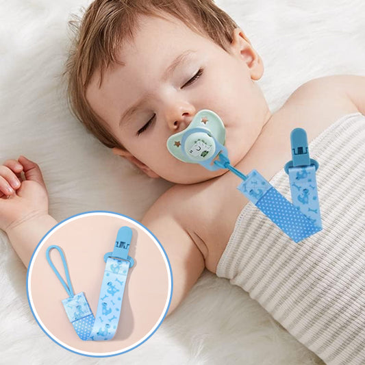 attache tétine bébé endormi