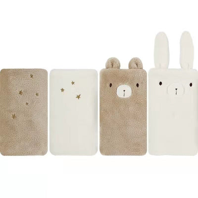 Coussinets doux dont certains décorés en ourson et en lapin