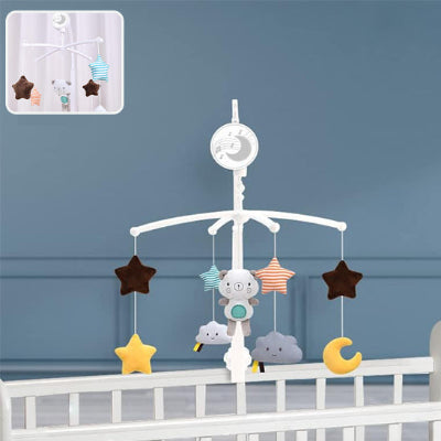 mobile bébé musical suspendu au lit du bébé