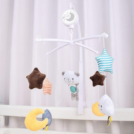 mobile bébé musical suspendu au lit