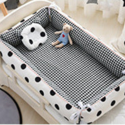 réducteur de lit bébé CoconÉvolutif™  motif dots
