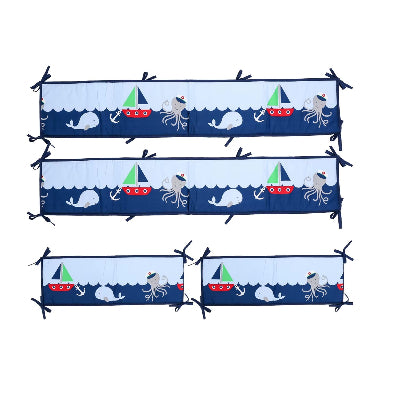 Tour de lit bebe garcon marin bleu décoré de bateaux, d'animaux marins et de vagues