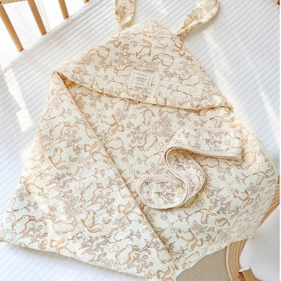 une turbulette à motif de forêt fantastique